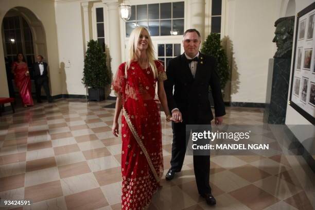 This November 24, 2009 photo shows Tareq Salahi and Michaele Salahi arriving for the State Dinner in honour of India's Prime Minister Manmohan Singh...