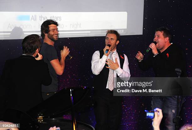 Mark Owen, Howard Donald and Gary Barlow of Take That and actor James Corden attend the SingStar Take That Extravaganza at the Tabernacle on November...
