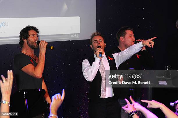 Howard Donald and Gary Barlow of Take That and actor James Corden attend the SingStar Take That Extravaganza at the Tabernacle on November 25, 2009...