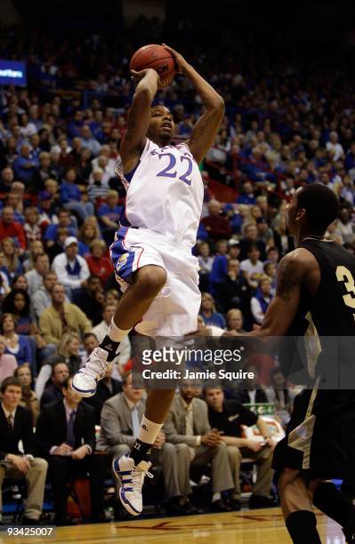 Marcus Morris of the Kansas Jayhawks shoots during the game against the Oakland Golden Grizzlies on November 25, 2009 at Allen Fieldhouse in...