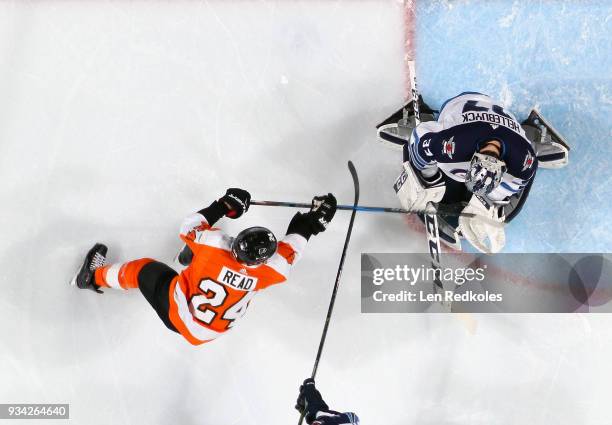 Matt Read of the Philadelphia Flyers attempts a shot on goal against Connor Hellebuyck of the Winnipeg Jets on March 10, 2018 at the Wells Fargo...