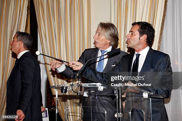 Maitre Georges Delettrez and Bernard Montiel attend the charity sale of teddy bears designed by famous fashion brands to the benefit of "Action...