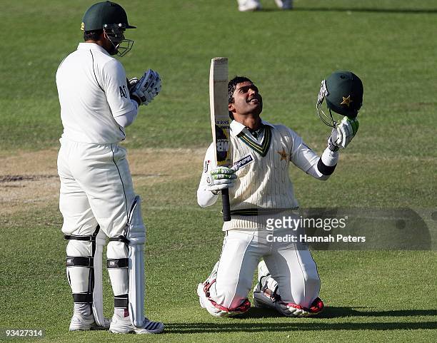 Umar Akmal of Pakistan celebrates scoring his maiden test century during day three of the First Test match between New Zealand and Pakistan at...