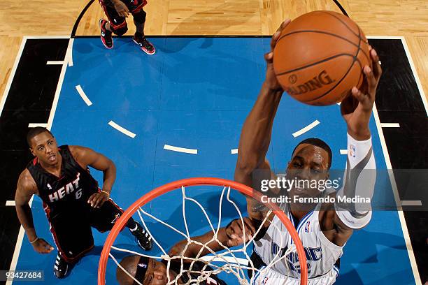 Dwight Howard of the Orlando Magic dunks against the Miami Heat during the game on November 25, 2009 at Amway Arena in Orlando, Florida. NOTE TO...