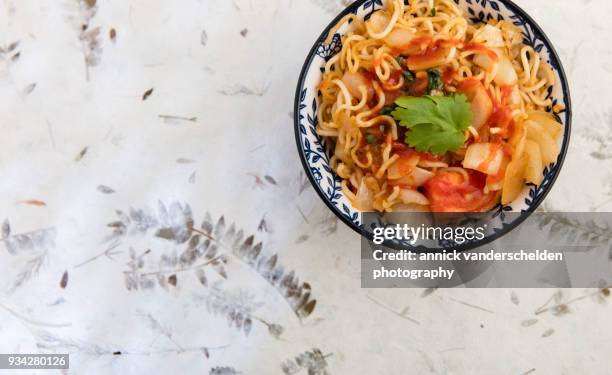 noodles with meat and vegetables. - chopping cilantro stock pictures, royalty-free photos & images