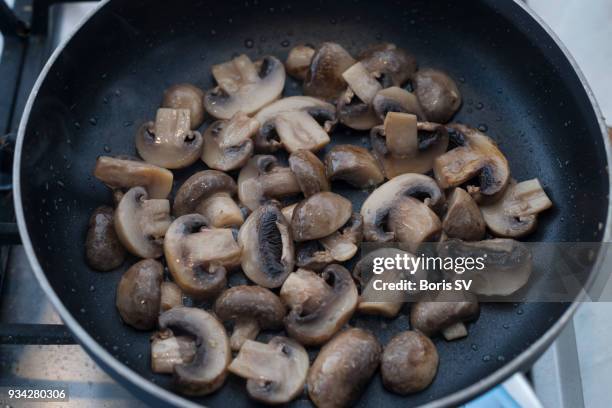 frying white mushrooms for risotto - cooked mushrooms stock pictures, royalty-free photos & images