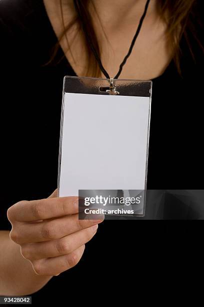blank id badge card - hands over stock pictures, royalty-free photos & images