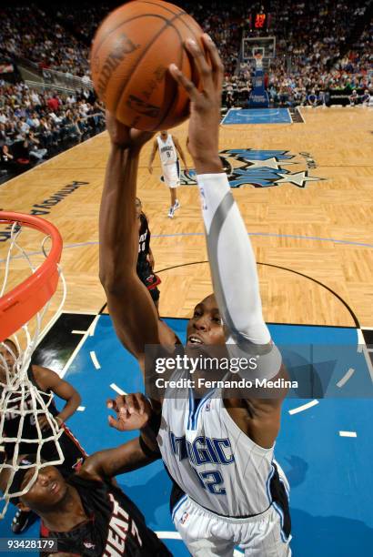 Dwight Howard of the Orlando Magic slam dunks against the Miami Heat during the game on November 25, 2009 at Amway Arena in Orlando, Florida. NOTE TO...