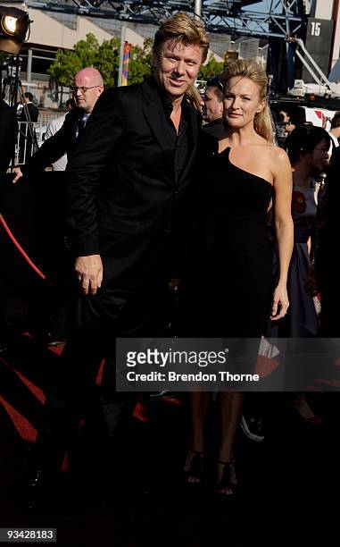 Personality Richard Wilkins & Rebecca Naso arrives on the red carpet at the 2009 ARIA Awards at Acer Arena on November 26, 2009 in Sydney, Australia.