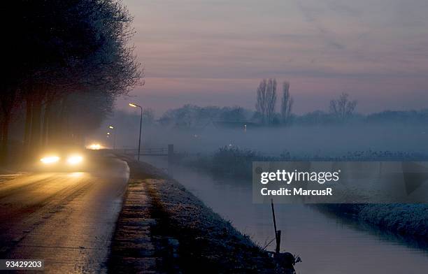 winter in holland - icy roads stockfoto's en -beelden