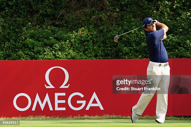 Francesco Molinari of Italy plays his tee shot on the 15th hole during Fourball on the first day of the Omega Mission Hills World Cup on the Olazabal...