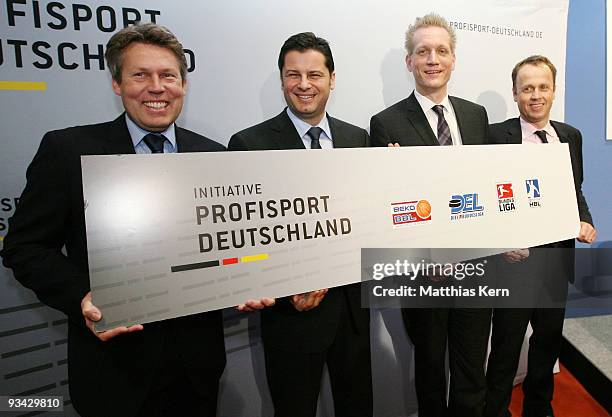 The general manager Gernot Tripcke , Christian Seifert , Jan Pommer and Frank Bohmann pose during a press conference under the motto 'Initiative...