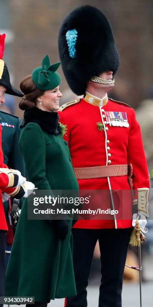 Catherine, Duchess of Cambridge presents sprigs of shamrock to soldiers of 1st Battalion Irish Guards during the annual Irish Guards St Patrick's Day...