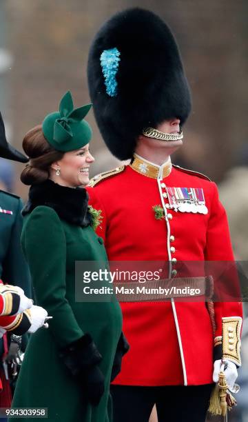 Catherine, Duchess of Cambridge presents sprigs of shamrock to soldiers of 1st Battalion Irish Guards during the annual Irish Guards St Patrick's Day...