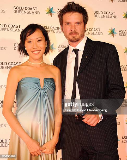 Gina Kim and Aden Young arrive at the Asia Pacific Screen Awards 2009 at the Gold Coast Convention and Exhibition Centre on November 26, 2009 in Gold...