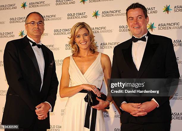 Phil O'Sullivan, Anna Coren and Chris Dwyer arrive at the Asia Pacific Screen Awards 2009 at the Gold Coast Convention and Exhibition Centre on...