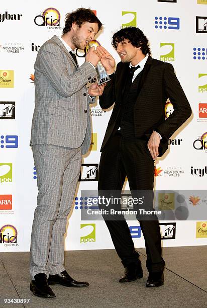 Comedians Hamish Blake and Andy Lee pose with the award for Best Comedy Album for 'Unessential Listening' in the Awards Room backstage at the 2009...