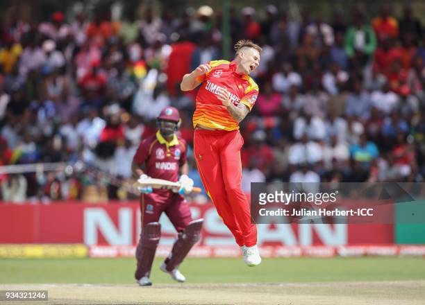 SEan Williams of Zimbabwe reacts as Evin Lewis of The West Indies scores runs of his bowling during The Cricket World Cup Qualifier between The West...