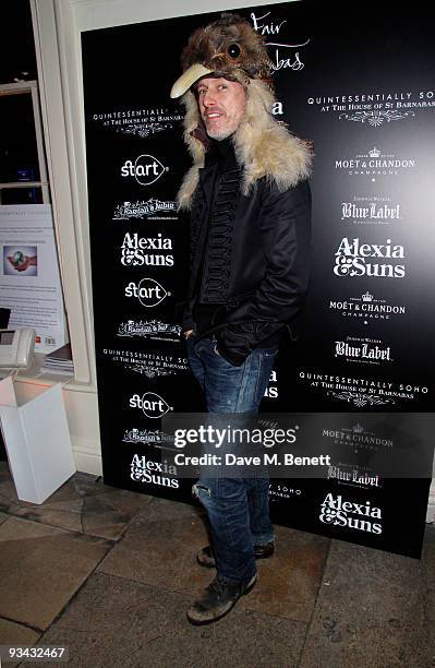 Patrick Cox poses at the Fair Of St Barnabas party hosted by Quintessentially on at the House of St Barnabas on November 25,2009 in London,England.