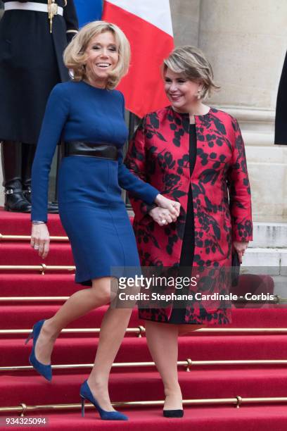 Brigitte Macron and Maria Teresa, Grand Duchess of Luxembourg in the courtyard of Elysee Palace on March 19, 2018 in Paris, France. Grand-Duke Henri...