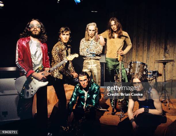 Phil Manzanera, Bryan Ferry, Andy Mackay , Brian Eno, Rik Kenton and Paul Thompson of Roxy Music pose for a group portrait at the Royal College Of...