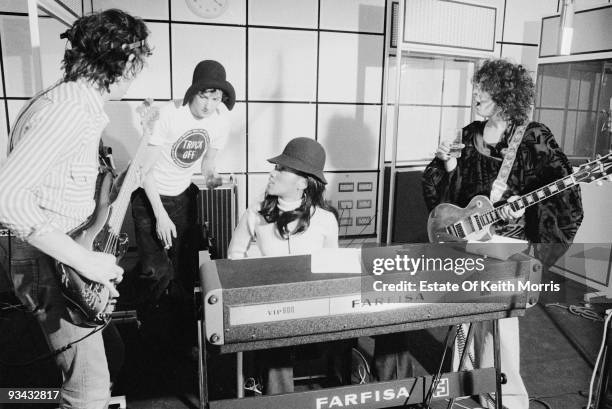 From left to right, guitarist Steve Currie , drummer Davey Lutton, American singer Gloria Jones and British singer Marc Bolan at Scorpio Studios in...