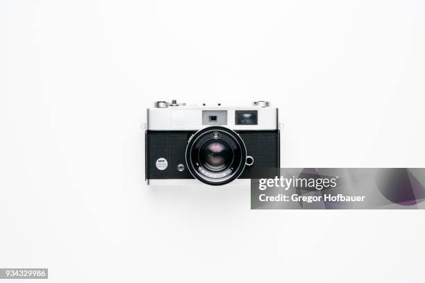 vintage analogue photo camera - camera stock-fotos und bilder