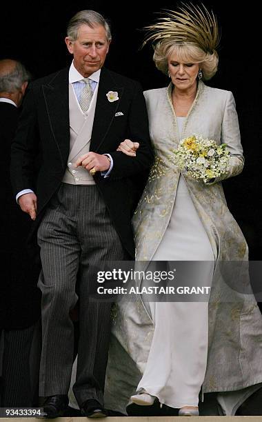 Britain's Prince Charles and his bride Camilla, Duchess of Cornwall leave St George's Chapel in Windsor following the church blessing of their civil...