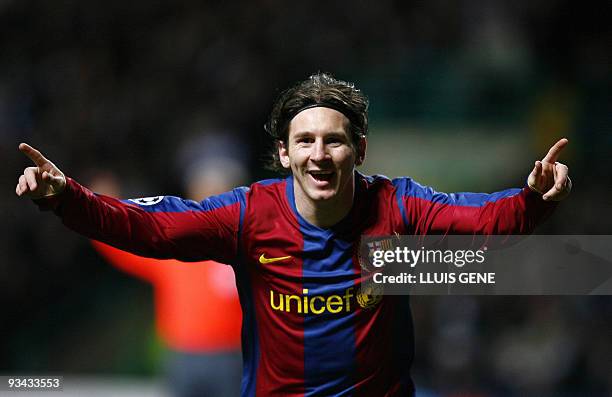 Barcelona's Argentinian forward Lionel Messi celebrates scoring against Celtic during their UEFA Cup Champions League football match at Celtic Park,...