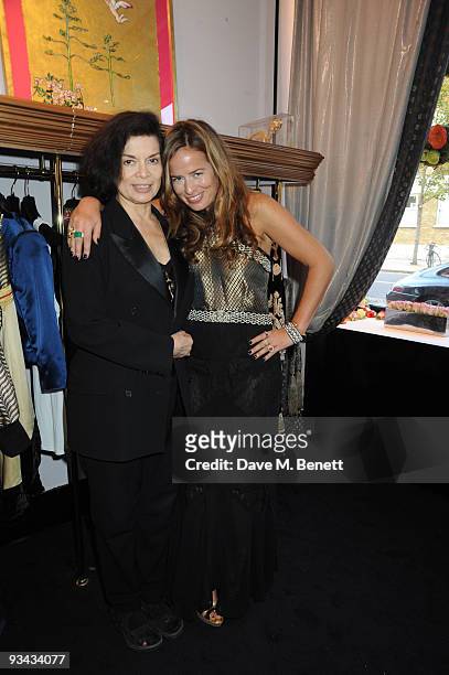 Artist and designer Jade Jagger poses with mother Bianca Jagger as she opens her own shop in the "All Saints Road" on November 25, 2009 in London,...
