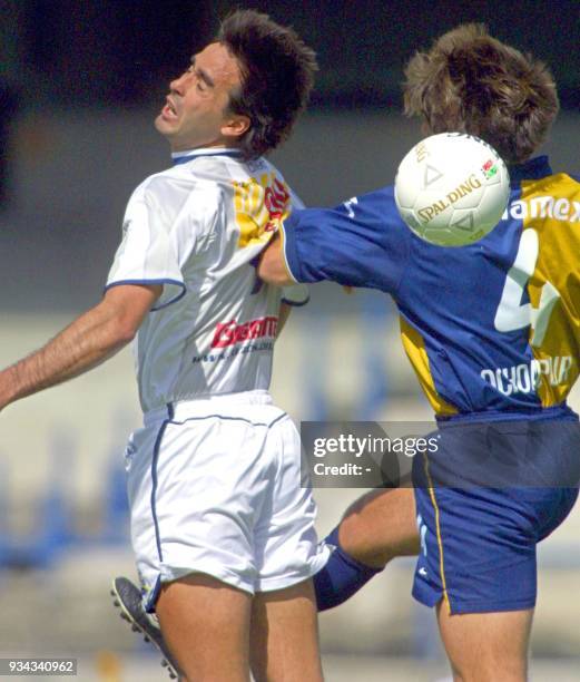 Walter Silvani of Pachuca hits Fernando Ochoaizpur of the Pumas in the Ciudad Universitaria stadium, Mexico City, 27 February 2002. Walter Silvani...