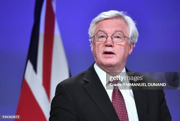 British Brexit minister David Davis addresses a press conference after his meeting with EU chief negotiator at the European Commission in Brussels on...