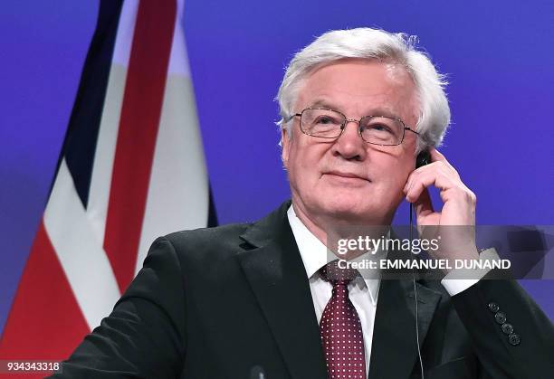 British Brexit minister David Davis addresses a press conference after his meeting with EU chief negotiator at the European Commission in Brussels on...