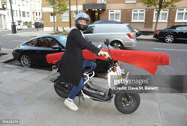 Artist and designer Jade Jagger's partner Dan Williams arrives at her own shop in the "All Saints Road" on November 25, 2009 in London, England.