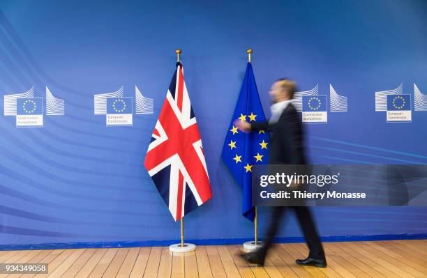 The Union Flag and the EU Flag are seen at the VIP entrance in the Berlaymont, the EU Commission headquarters, on March 19, 2018 in Brussels, Belgium.