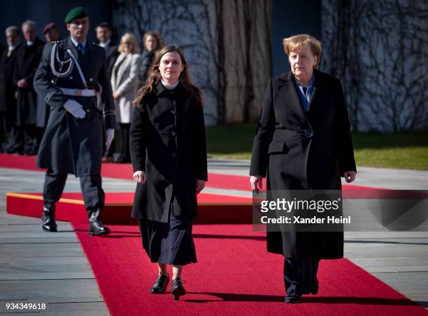 German Chancellor and leader of the German Christian Democrats Angela Merkel welcomes Island's Prime Minister Katrin Jakobsdottir with military honor...