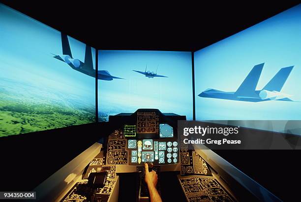 flight simulator,hand operating joystick - simulador de vuelo fotografías e imágenes de stock