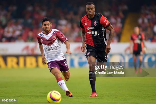 Daniel Villalva of Veracruz and Jaine Barreiro of Atlas compete for the ball during the 12th round match between Veracruz and Atlas as part of the...