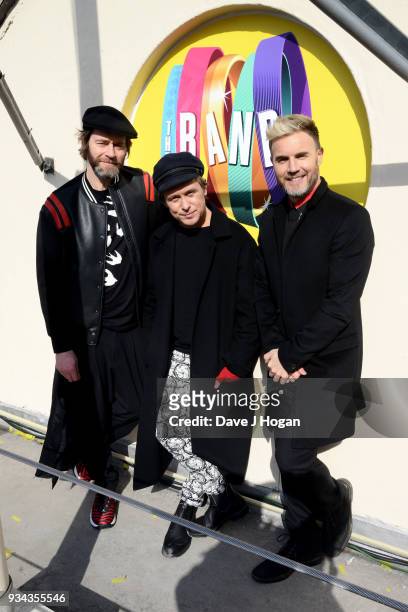 Howard Donald, Mark Owen and Gary Barlow of Take That pose on the roof of The Theatre Royal Haymarket on March 19, 2018 in London, England.