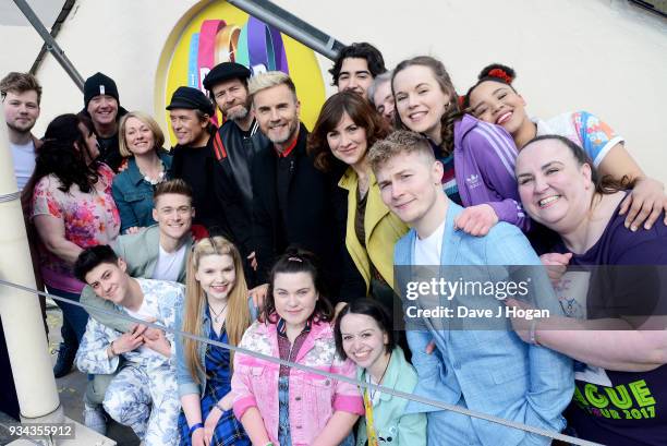 Mark Owen, Howard Donald and Gary Barlow of Take That pose on the roof of The Theatre Royal Haymarket on March 19, 2018 in London, England.