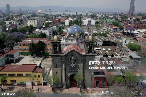 This aerial picture taken on March 18 shows a Catholic church which was damaged during the September 19, 2017 earthquake at Laredo street in Mexico...