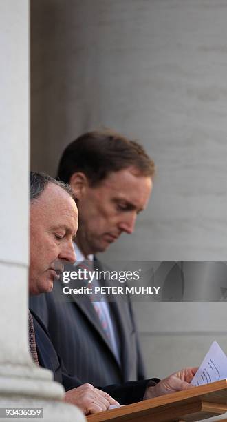 Irish Minister of Justice Dermot Ahern reads out a statement with Barry Andrews , Irish Minister for Children and Youth Affairs in relation to a 700...