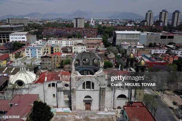 This aerial picture taken on March 18 shows a Catholic church which was damaged during the September 19, 2017 earthquake at Laredo street in Mexico...