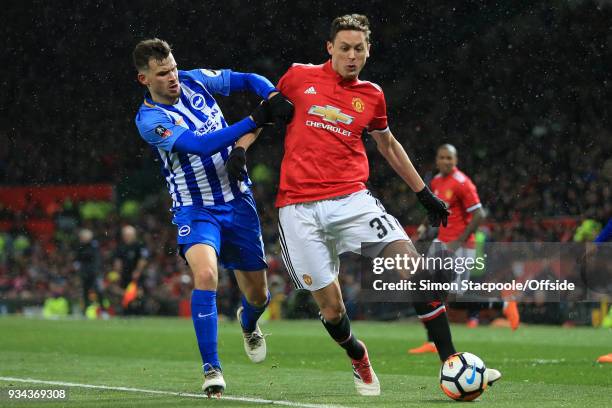 Pascal Gross of Brighton battles with Nemanja Matic of Man Utd during The Emirates FA Cup Quarter Final match between Manchester United and Brighton...