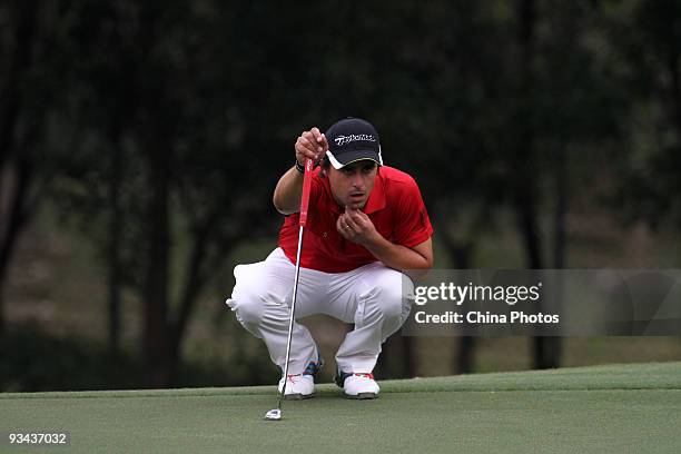 Tano Goya of Argentina in action on the 14th hole during Fourball on the first day of the Omega Mission Hills World Cup on the Olazabal course on...