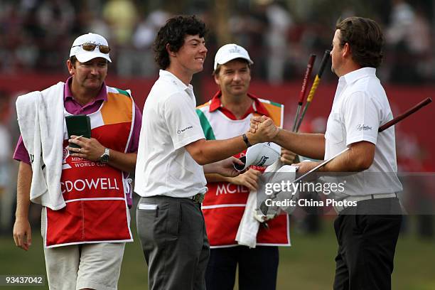 Graeme McDowell and Rory McIlroy of Ireland during Fourball on the first day of the Omega Mission Hills World Cup on the Olazabal course on November...