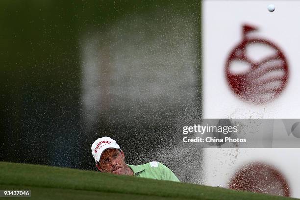 Stuart Appleby of Australia plays a shot on the first hole during Fourball on the first day of the Omega Mission Hills World Cup on the Olazabal...