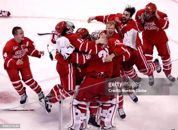 Boston University Terriers goaltender Jake Oettinger is at the center of the celebration as time runs out on Providence College and BU wins the...