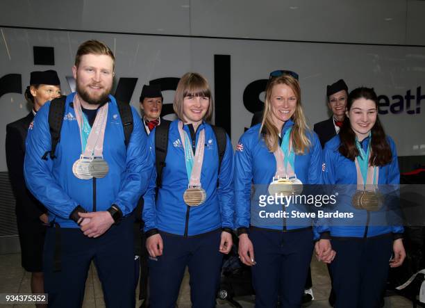 Medaliists Brett Wild, Millie Knight, Jen Kehoe and Menna Fitzpatrick pose with their respective medals as Team ParalympicsGB arrive back from the...