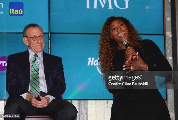 Serena Williams of the United States speaks at the press conference watched by Stephen Ross, Miami Dolphins owner prior to the ground breaking...